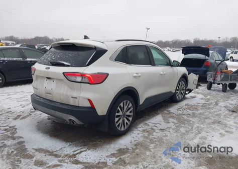 2021 Ford Escape Titanium Hybrid from USA, damaged, VIN 1FMCU9DZ6MUB15355